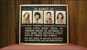 Photo of a plaque honoring the four girls who were killed in the 16th Street Baptist Church bombing.